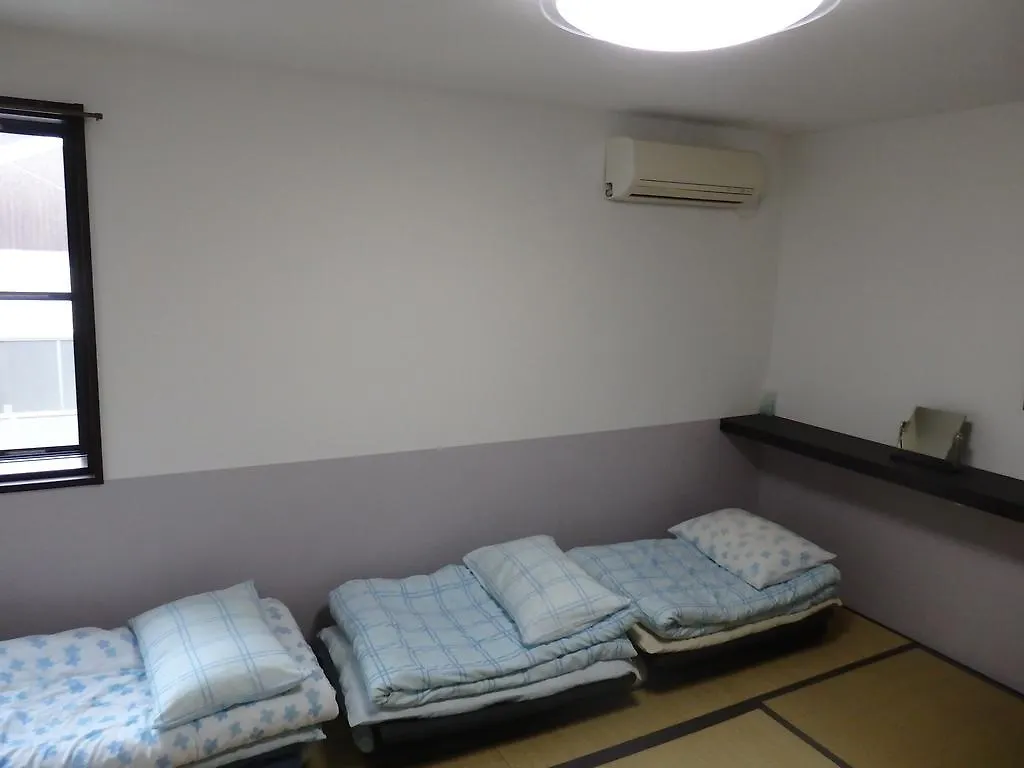 קיוטו Guesthouse Yahata בית הארחה