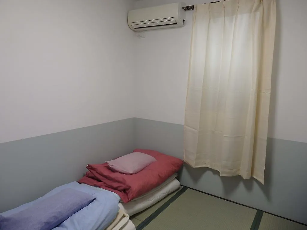 קיוטו Guesthouse Yahata בית הארחה