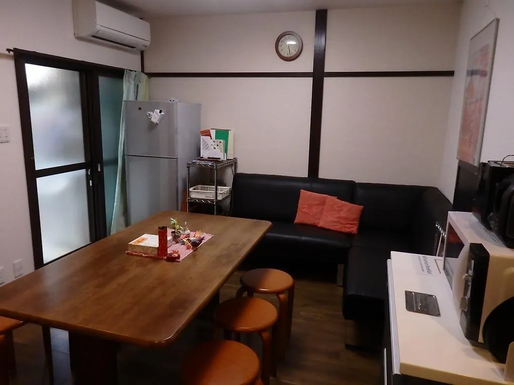 קיוטו Guesthouse Yahata בית הארחה
